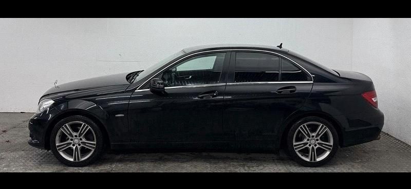 Second-hand Mercedes C180 156 CP (114 kW) 2011 Negru Berlinǎ