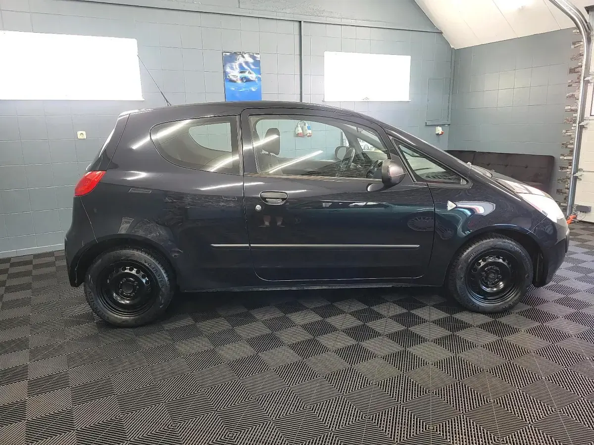 Gebraucht Mitsubishi Colt 60 PS (44 kW) 2008 Schwarz Kleinwagen