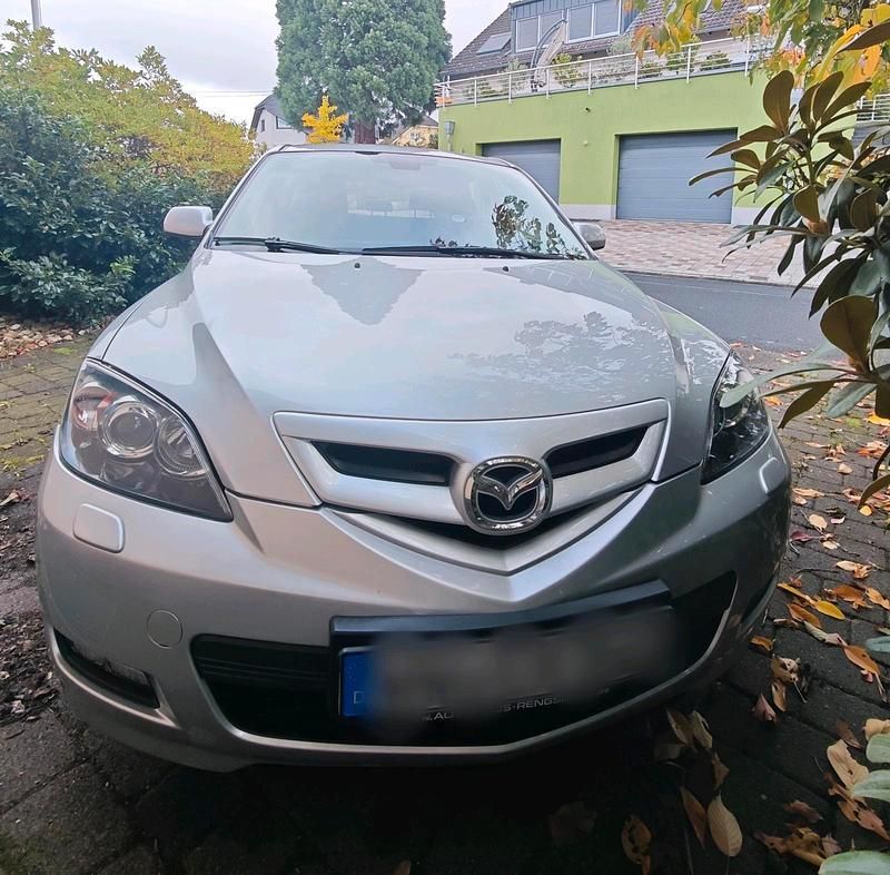 Grau Gebraucht 2009 Mazda 3 Kleinwagen | 4.000 € (Fairer Preis) - Bild 1/4