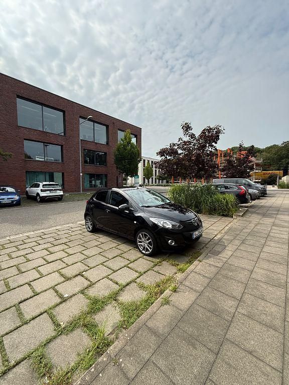 Gebraucht Mazda 2 84 PS (61 kW) 2013 Schwarz Kleinwagen