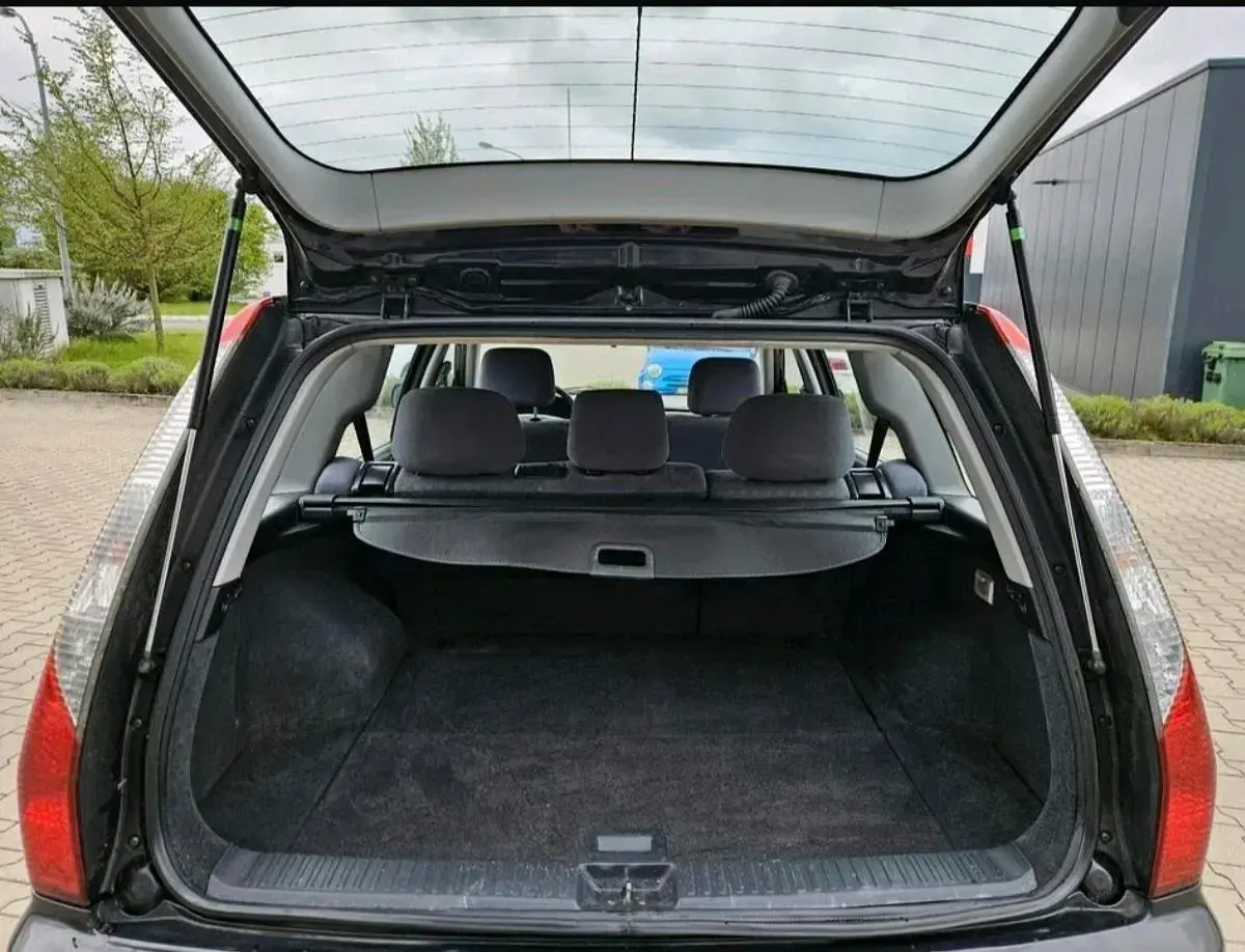 Second-hand Mitsubishi Lancer 100 CP (73 kW) 2004 Negru Break