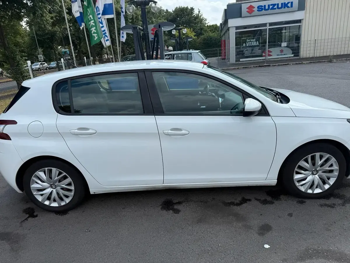 Gebraucht Peugeot 308 125 PS (91 kW) 2014 Weiß Kombi