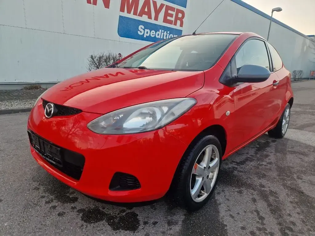 Gebraucht Mazda 2 Inclusive 75 PS (55 kW) 2009 Rot Kleinwagen
