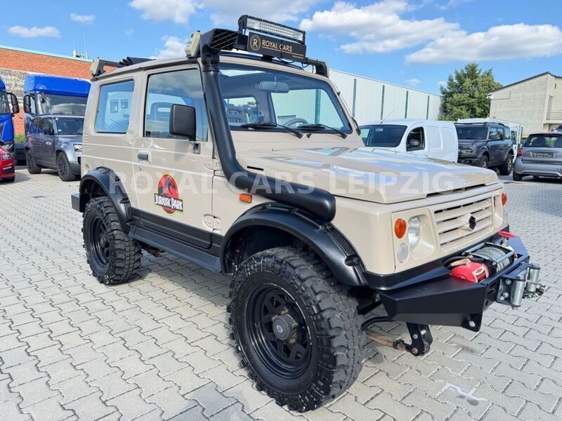 Gelb Gebraucht 1999 Suzuki Samurai SUV | 19.990 € - Bild 1/4