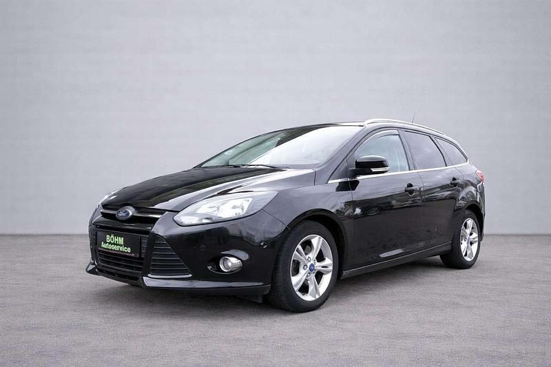 Gebraucht Ford Focus Champions Edition 125 PS (91 kW) 2013 Pantherschwarz metallic Kombi