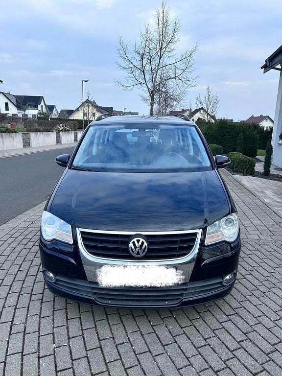 Gebraucht VW Touran 105 PS (77 kW) 2010 Schwarz Van / Kleinbus