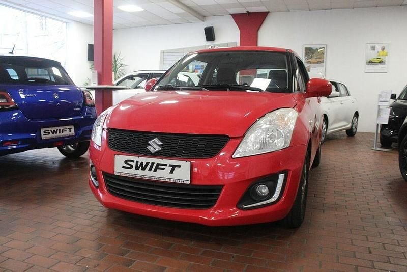 Rot Gebraucht 2016 Suzuki Swift Club Kleinwagen | 7.900 € (Fairer Preis) - Bild 1/4
