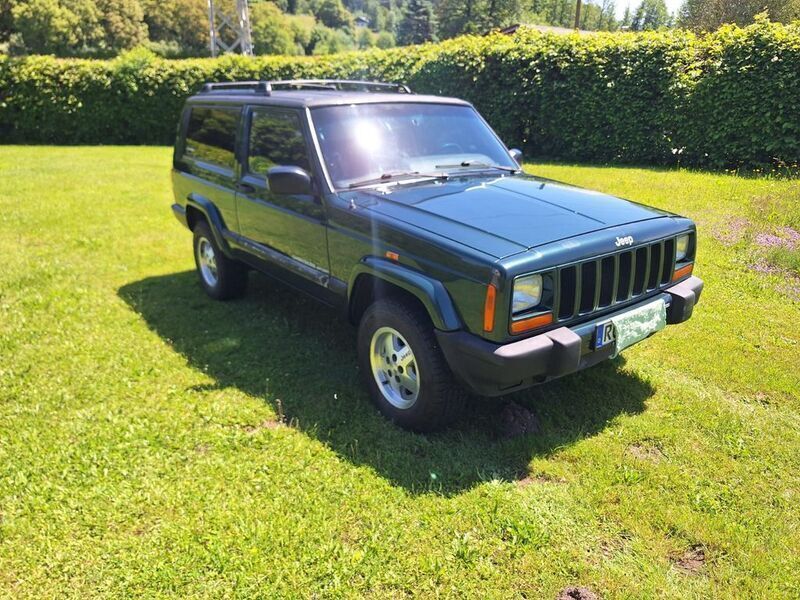 Grün Gebraucht 1999 Jeep Cherokee SUV | 13.900 € - Bild 1/4