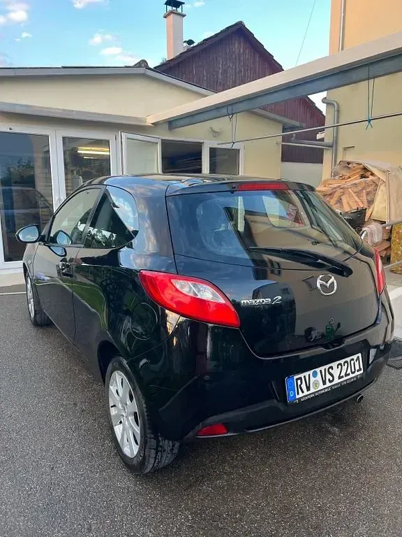 Gebraucht Mazda 2 75 PS (55 kW) 2010 Schwarz Kleinwagen