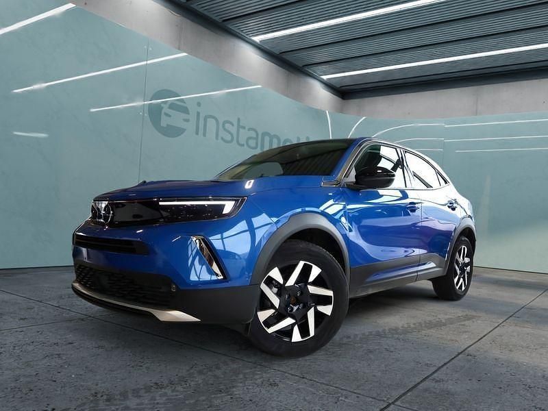 Blau Gebraucht 2023 Opel Mokka-e Elegance SUV | 24.649 € (Etwas zu teuer) - Bild 1/4