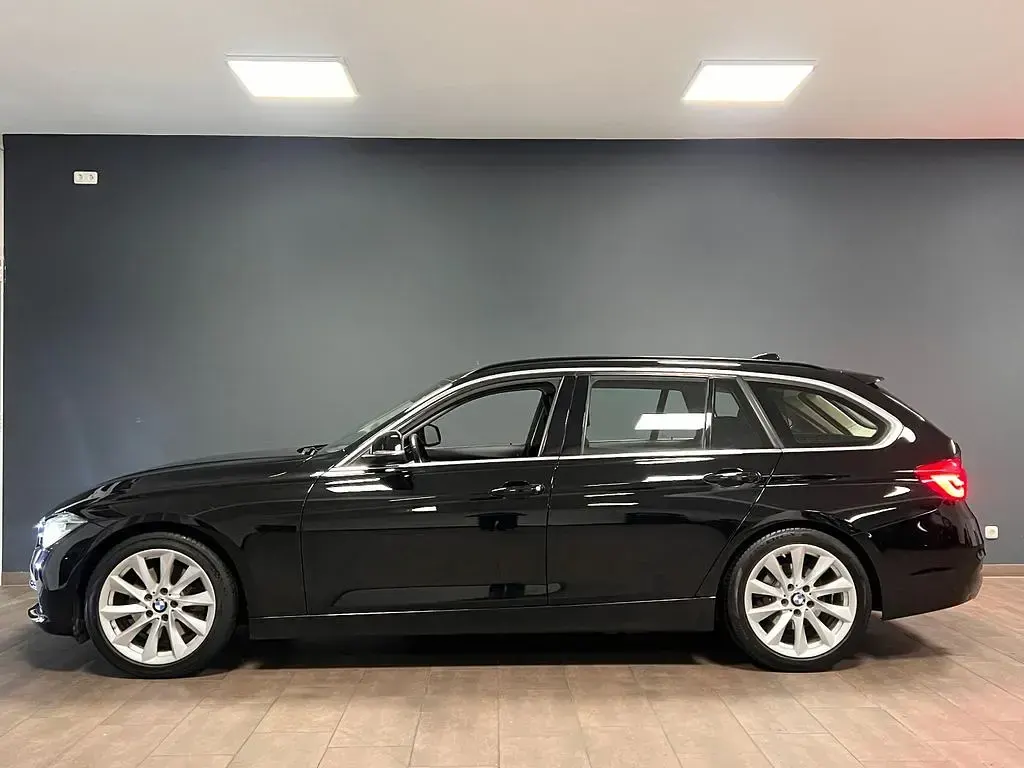 Second-hand BMW 330 Luxury Line 252 CP (185 kW) 2015 Negru Break