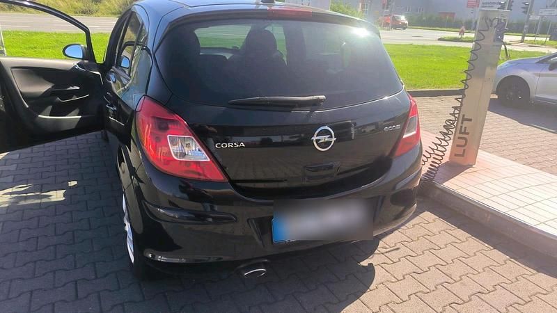 Gebraucht Opel Corsa 95 PS (69 kW) 2011 Schwarz Kleinwagen