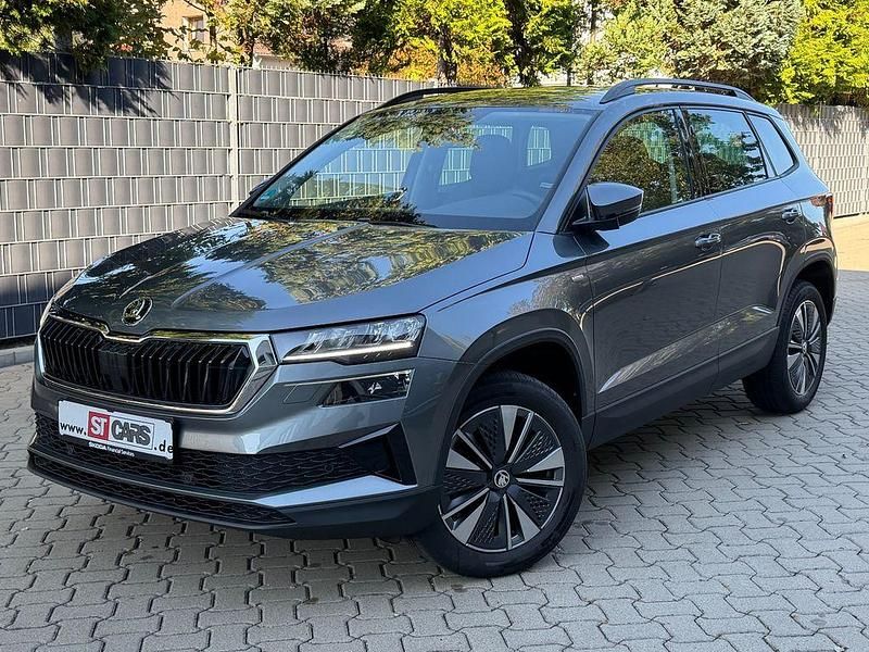 Graphitegrau metallic Gebraucht 2024 Skoda Karoq Tour SUV | 25.990 € (Guter Preis) - Bild 1/4