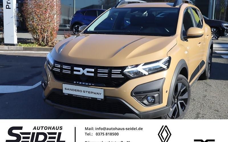 Beige Neu 2025 Dacia Sandero Expression Limousine | 16.987 € - Bild 1/4