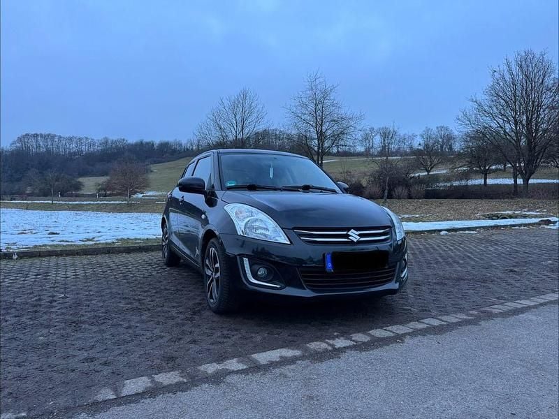 Schwarz Gebraucht 2016 Suzuki Swift X-TRA Kleinwagen | 7.800 € (Fairer Preis) - Bild 1/4