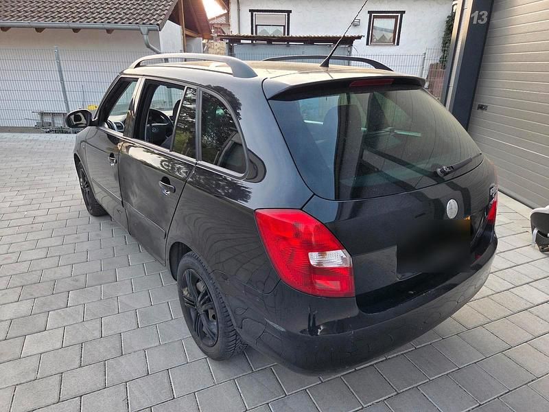 Second-hand Skoda Fabia 69 CP (50 kW) 2010 Negru Break