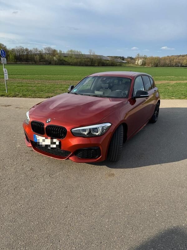 Orange Gebraucht 2018 BMW M140 M Sport Limousine | 24.950 € (Superpreis) - Bild 1/4