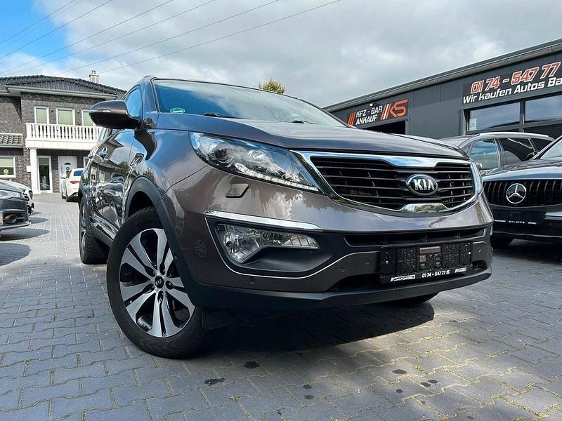 Grau Gebraucht 2014 Kia Sportage Spirit SUV | 8.950 € (Fairer Preis) - Bild 1/4