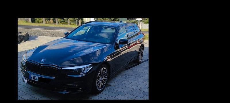Schwarz Gebraucht 2019 BMW 520 Sport Line Kombi | 22.999 € (Superpreis) - Bild 1/4