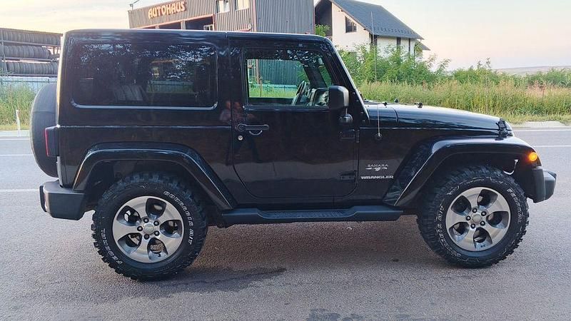 Schwarz Gebraucht 2017 Jeep Wrangler Sahara SUV | 31.600 € (Fairer Preis) - Bild 1/4