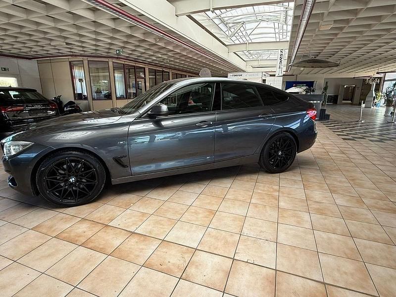 Grau Gebraucht 2015 BMW 330 Gran Turismo Sport Line Limousine | 12.990 € (Fairer Preis) - Bild 1/4