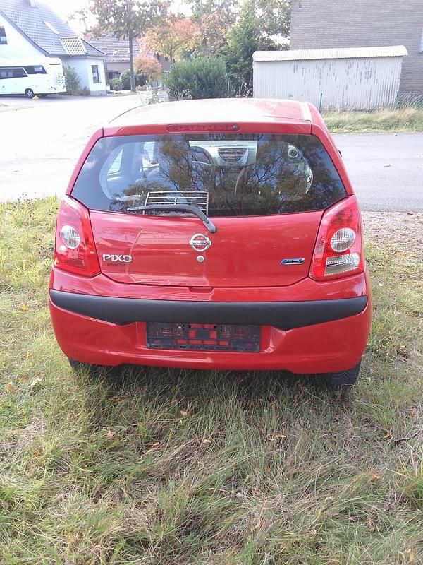 Gebraucht Nissan Pixo 68 PS (50 kW) 2010 Rot Kleinwagen