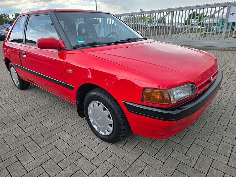 Gebraucht Mazda 323 88 PS (64 kW) 1993 Rot Limousine