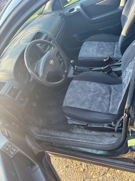 Second-hand Opel Astra 75 CP (55 kW) 1999 Verde Berlinǎ