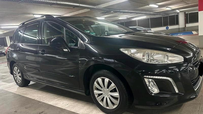 Gebraucht Peugeot 308 120 PS (88 kW) 2012 Schwarz Kombi