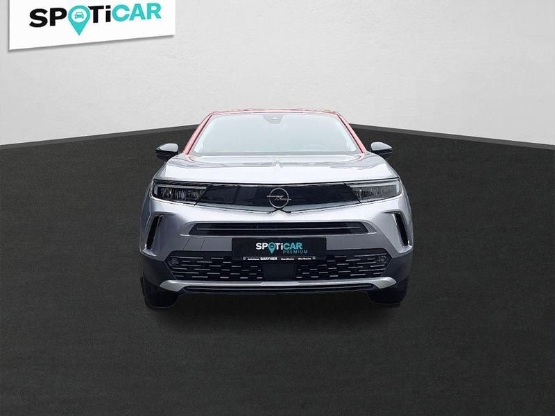 Gebraucht Opel Mokka-e Elegance 100 kW (136 PS) 2022 Kontrast grau/quarz silber SUV