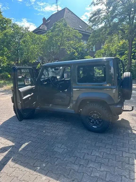 Gebraucht Suzuki Jimny Comfort 102 PS (75 kW) 2023 Grün SUV