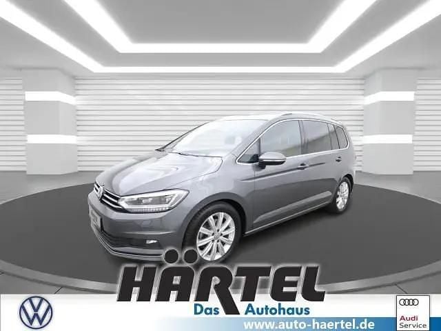 Indiumgrau (grey), metallic Gebraucht 2017 VW Touran Highline Van / Kleinbus | 21.800 € (Fairer Preis) - Bild 1/4