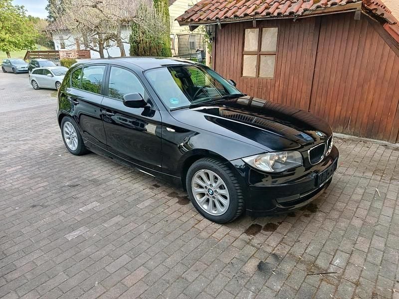 Second-hand BMW 116 122 CP (89 kW) 2011 Negru Hatchback