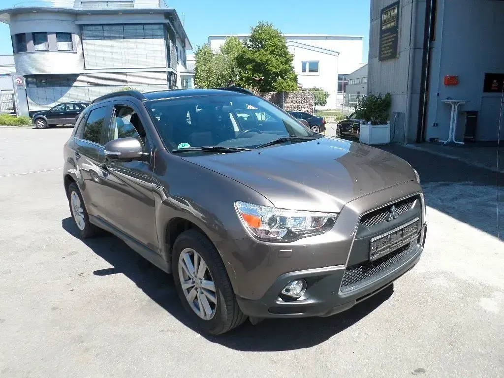 Używany Mitsubishi ASX Intense 150 KM (110 kW) 2011 Brązowy SUV