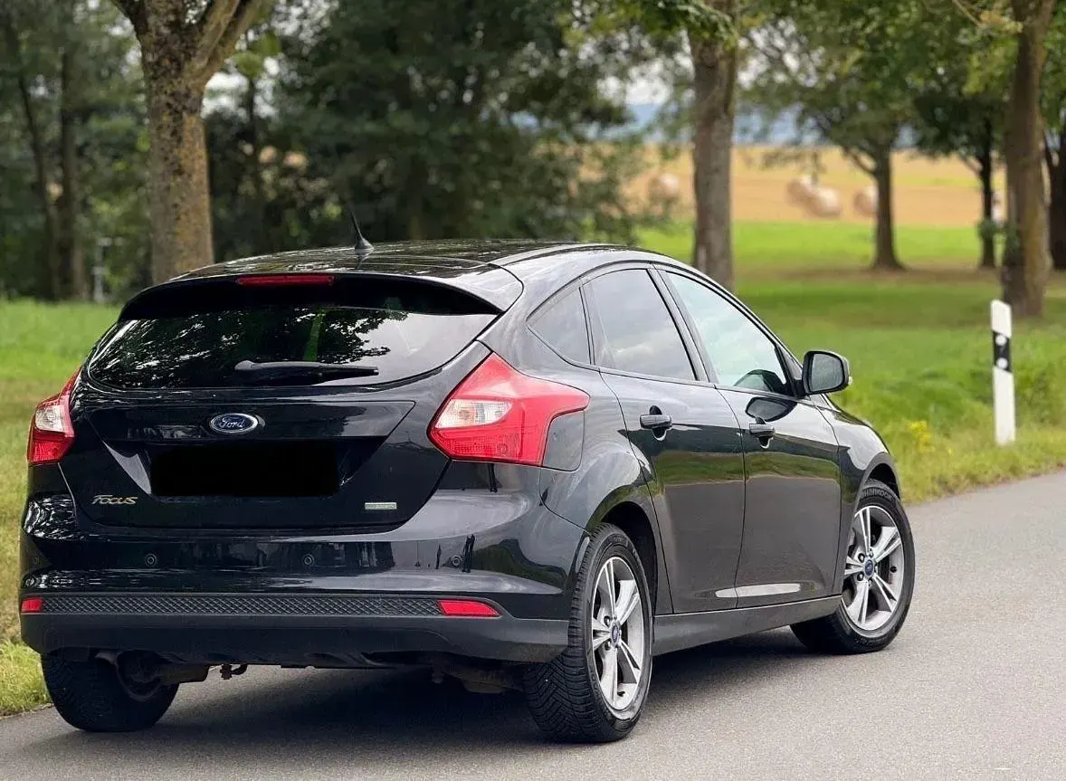 Gebraucht Ford Focus Titanium 125 PS (91 kW) 2013 Schwarz Limousine