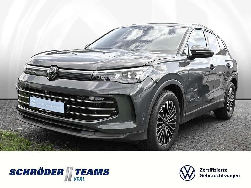Delfingrau metallic Gebraucht 2024 VW Tiguan Elegance SUV | 36.780 € (Fairer Preis) - Bild 1/4