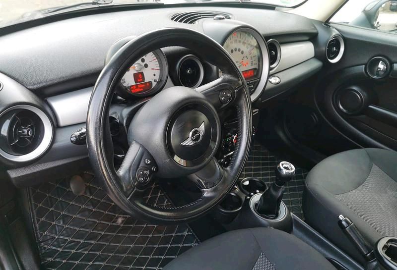 Gebraucht Mini Cooper 74 PS (54 kW) 2012 Schwarz Kleinwagen