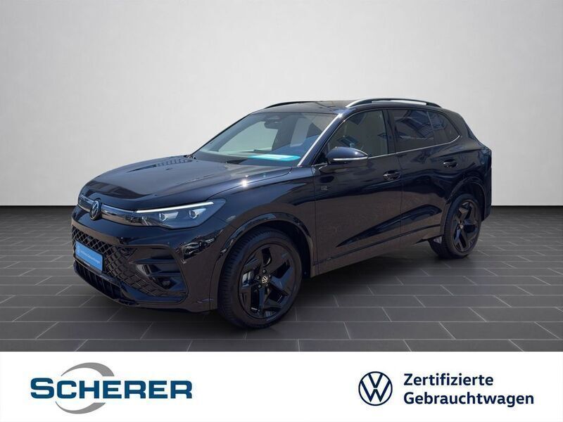 Deep black perleffekt (metallic) Gebraucht 2024 VW Tiguan R-line SUV | 39.900 € (Fairer Preis) - Bild 1/4