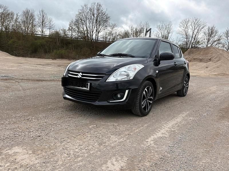 Gebraucht Suzuki Swift X-TRA 94 PS (69 kW) 2015 Schwarz Kleinwagen