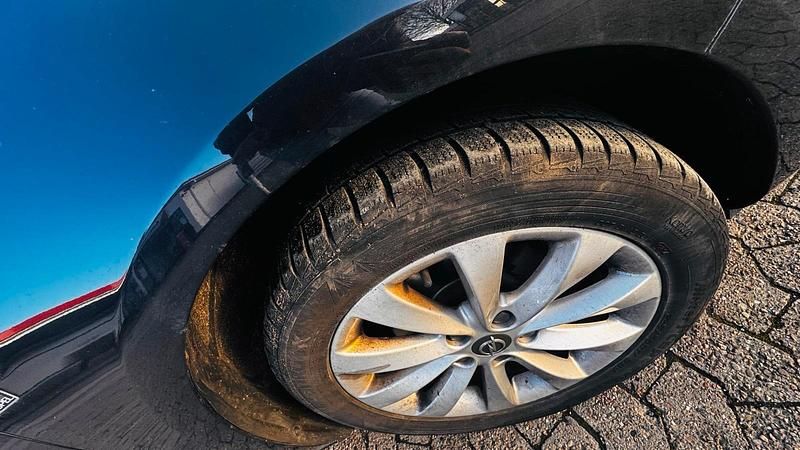 Gebraucht Opel Astra 102 PS (75 kW) 2012 Schwarz Kombi