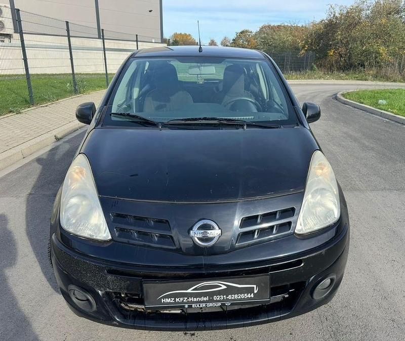 Gebraucht Nissan Pixo Acenta 69 PS (50 kW) 2010 Schwarz Kleinwagen