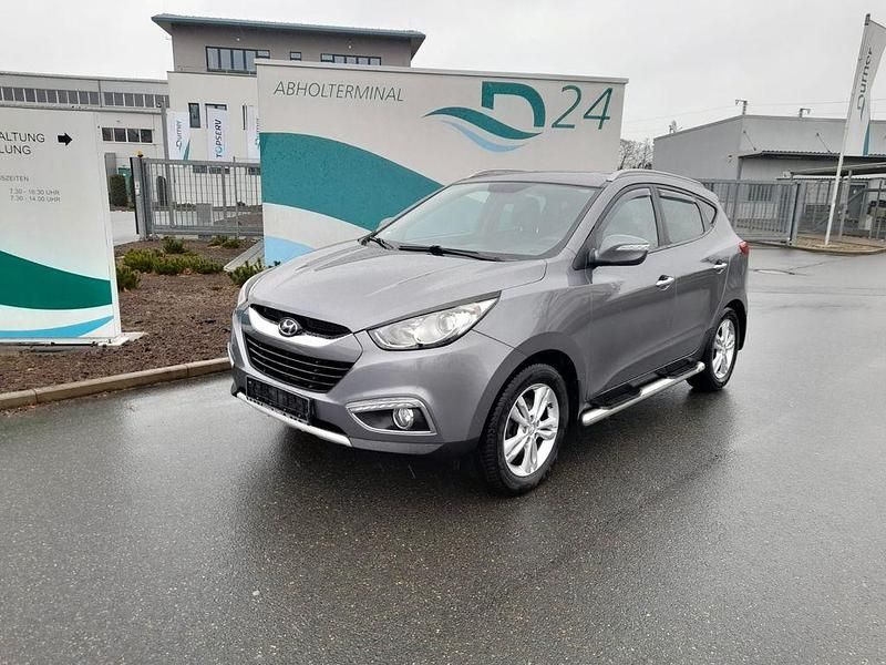 Grau Gebraucht 2012 Hyundai ix35 Premium SUV | 9.490 € (Fairer Preis) - Bild 1/4