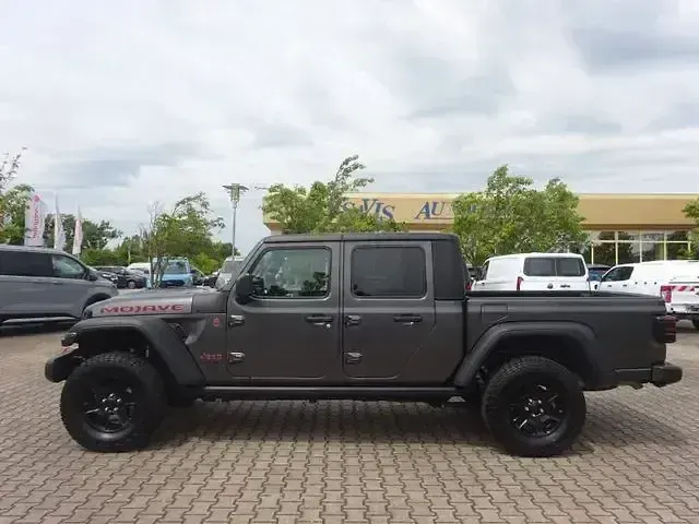 Gebraucht Jeep Gladiator 290 PS (213 kW) 2023 Granite crystal met. clear coa Pickup