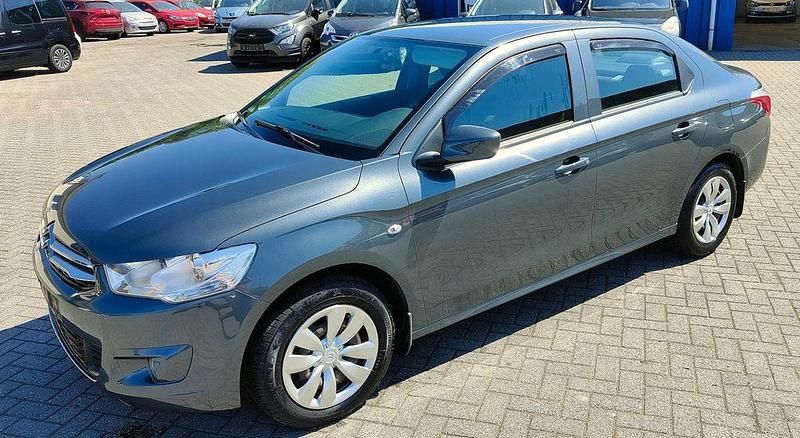 Grün Gebraucht 2016 Citroën C-Elysee I PureTech Limousine | 4.300 € - Bild 1/4