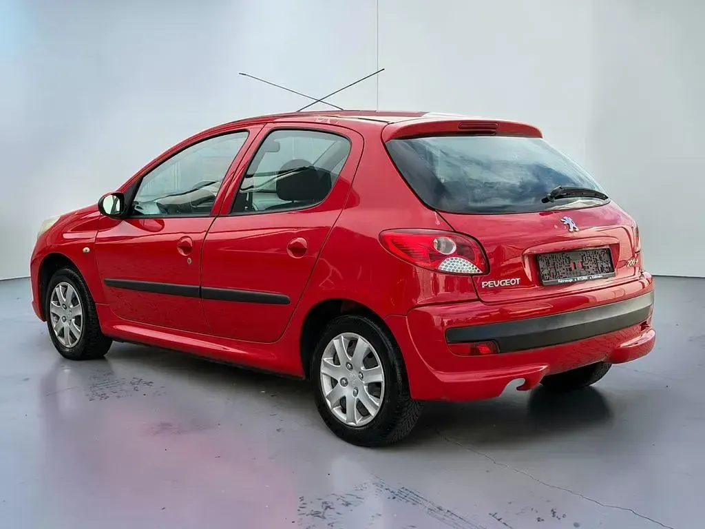 Gebraucht Peugeot 206+ Basis 60 PS (44 kW) 2009 Rot Kleinwagen