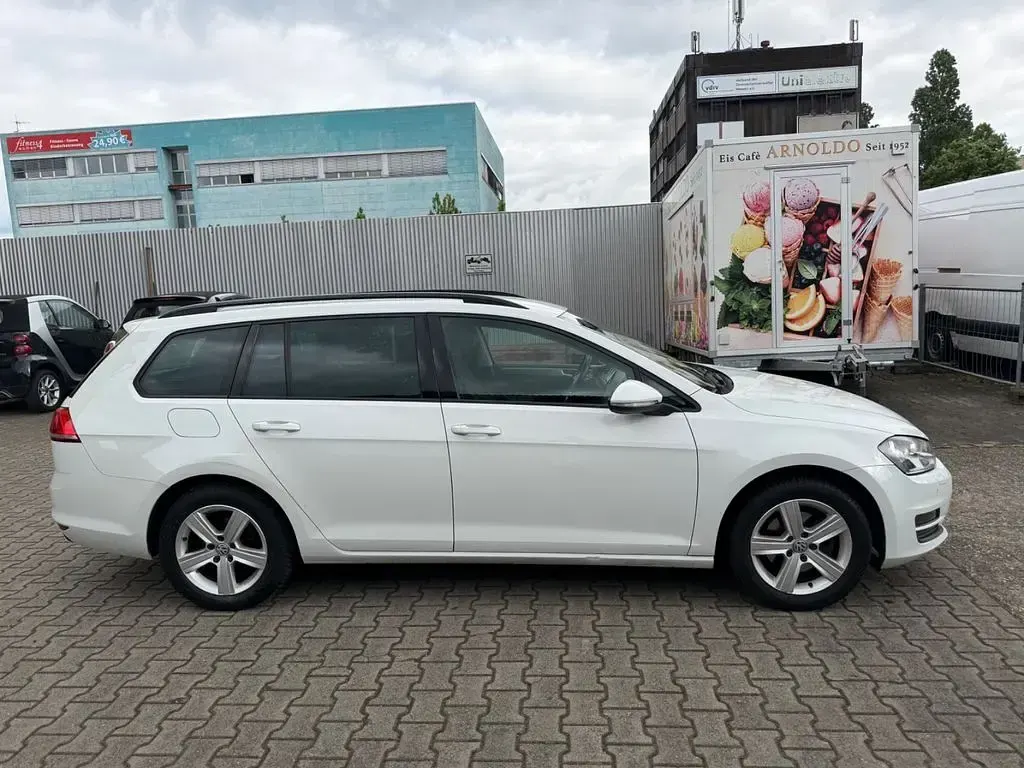 Second-hand VW Golf VII Comfortline 105 CP (77 kW) 2014 Alb Break