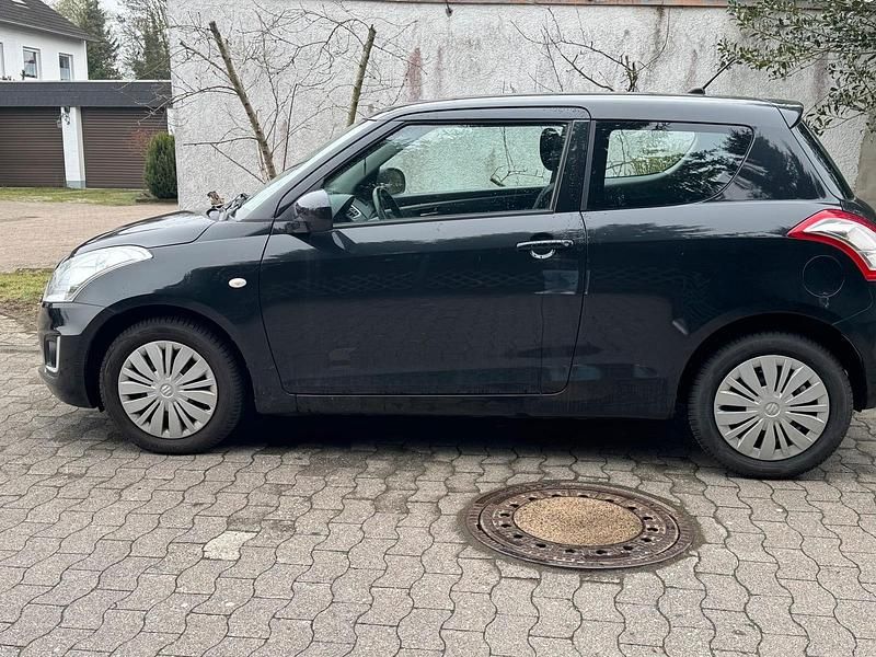 Gebraucht Suzuki Swift 94 PS (69 kW) 2015 Schwarz Kleinwagen