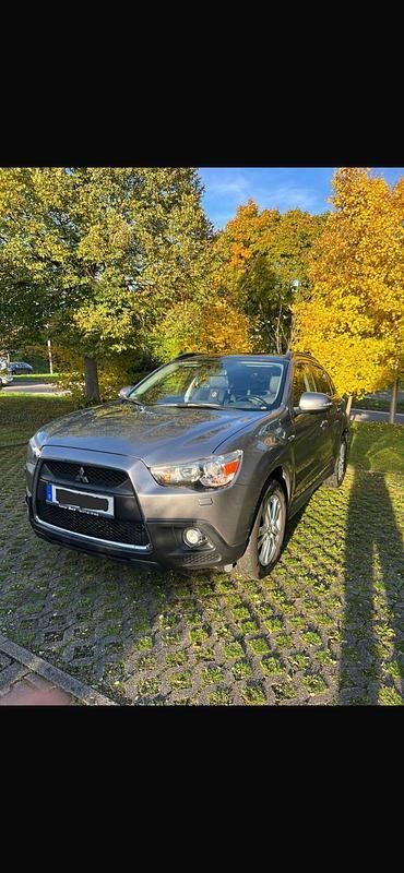 Grau Gebraucht 2013 Mitsubishi ASX SUV | 6.900 € - Bild 1/4