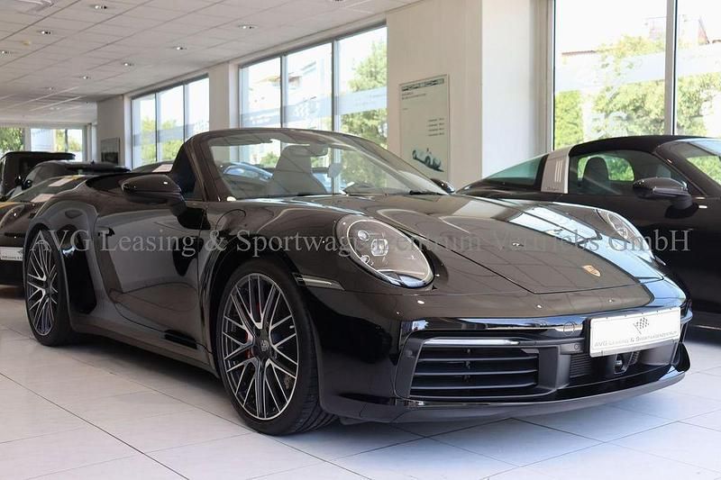 Glanzschwarz Gebraucht 2024 Porsche 911 Carrera 4S Cabriolet Chrono Cabrio | 169.800 € (Teuer) - Bild 1/4