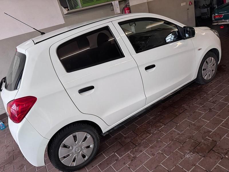 Second-hand Mitsubishi Space Star 72 CP (52 kW) 2014 Alb Monovolum